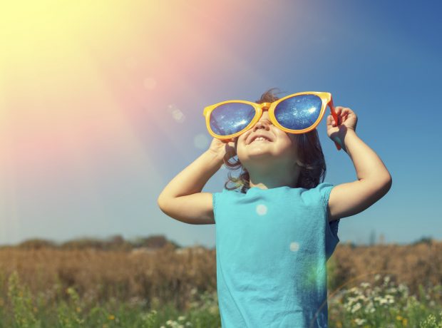 image-little-girl-with-big-sunglasses-enjoys-sun