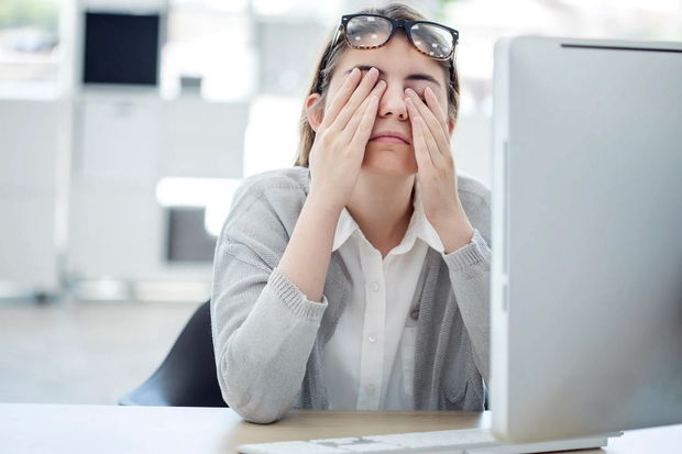 image-woman-rubbing-tired-eyes-computer-gettyimages-830293564
