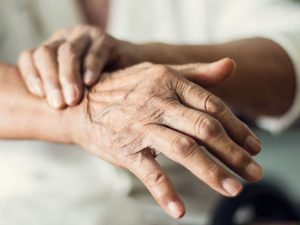 image-close-up-hands-of-senior-elderly-woman-patient-suffering-from