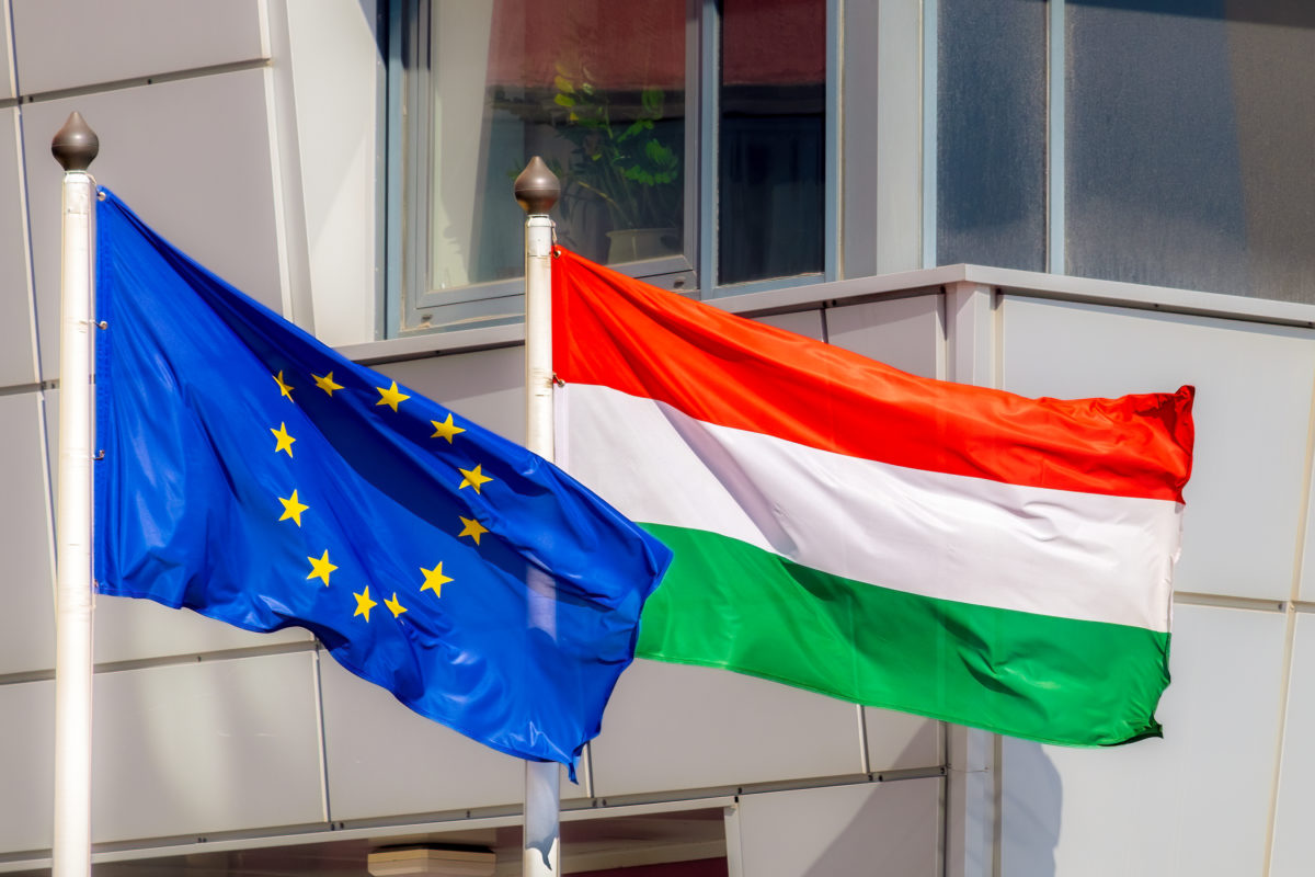 image-the-flags-of-the-european-union-and-hungary-are-waving-in-the-wind