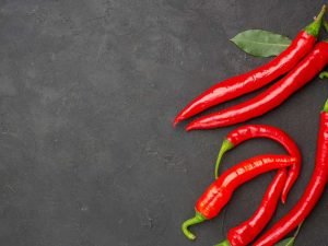 image-top-close-view-red-peppers-pay-leaves-right-side-black-table-with-free-space_140725-81191-pic_32ratio_900x600-900x600-23789